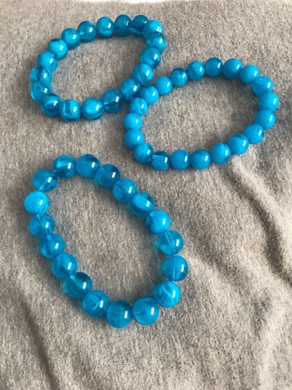 Set of Three Bright Blue Beaded Stretch Bracelets